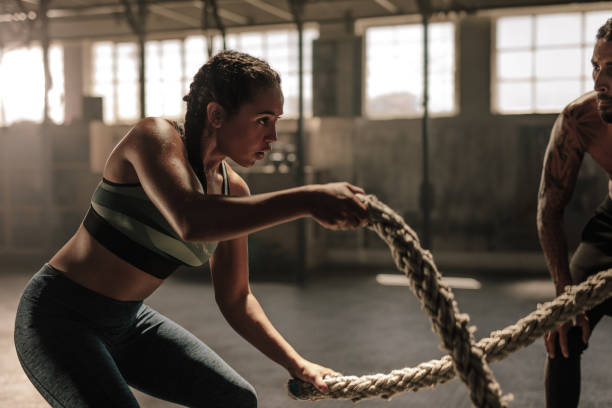 Woman lifting dumbbells